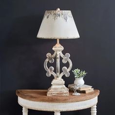 a table with a lamp on top of it