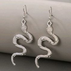 Pair Of Silver-Tone Slithering Snake Textured Earrings Eardrop Height: 2.8 In (7 Cm) Width: 2.5 In (7 Cm) Snake Clothes, Slithering Snake, Spider Earrings, Sapphire Earrings Studs, Bamboo Earrings, Beaded Tassel Earrings, Snake Earrings, Heart Shaped Earrings, Heart Dangle Earrings