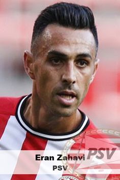 the soccer player is wearing a red and white striped shirt with his name on it