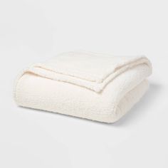 two white towels folded on top of each other