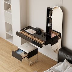 a bedroom with a bed, desk and mirror