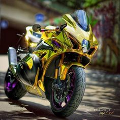 a yellow and black motorcycle parked on the street