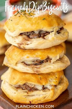 three biscuits stacked on top of each other with the words french dip biscuits above them