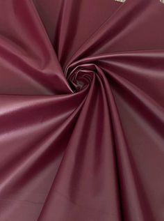 a close up shot of the maroon fabric