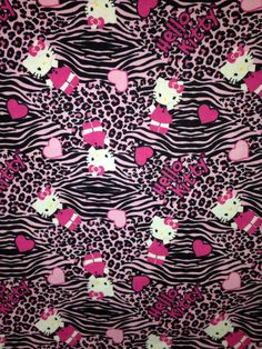 an animal print fabric with pink hearts and zebras on black, white and pink