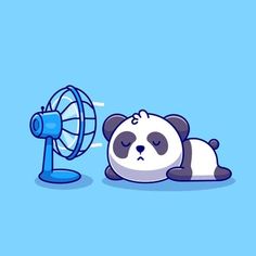 a panda bear laying on the ground next to a fan