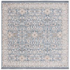 a blue and beige rug with an intricate design