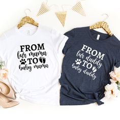 two t - shirts that say from the mama to baby, and dog paw prints on them