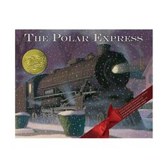 a book about the polar express on a wooden table with pine cones and christmas decorations