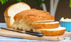 a loaf of bread sitting on top of a cutting board