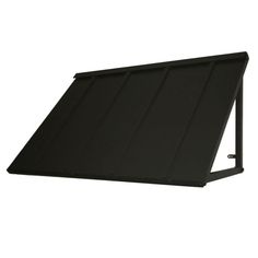 a black awning on top of a white wall with the bottom half closed up
