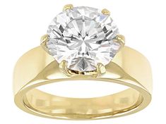 Moissanite Fire(R) 4.20ct diamond equivalent weight round, 14k yellow gold over sterling silver ring. Measures 5/16" L x 1/16" W and is not sizeable. Actual moissanite weight is 3.57ct. Comes with certificate of authenticity. Wedding Rings With Thick Bands, Thick Band Wedding Rings, Thick Band Engagement Ring, Wide Band Diamond Rings, Wide Band Engagement Ring, Gold Band Engagement Rings, Thick Gold Band, Diamond Band Engagement Ring, Ring Settings