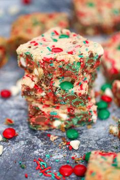 christmas cookie bars with candy and sprinkles on top