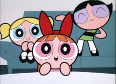 the powerpuff girls are standing next to each other