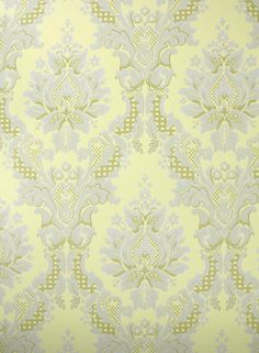 a yellow and white wallpaper with an ornate design