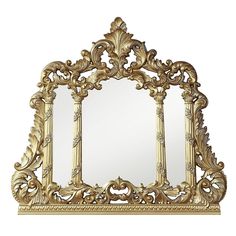 an ornate gold mirror on a white background