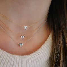 The Full Cut Diamond Heart Choker Necklace is the little sister to the Diamond Heart Solitaire Necklace, but shines just as bright. Featuring 0.26 carats of full cut diamond, this necklace is simply heartwarming. Layering Diamond Necklaces, Heart Diamond Necklace, Heart Shaped Diamond Necklace, Heart Choker Necklace, Solitaire Necklace, Heart Necklace Diamond, Heart Diamond, Heart Choker, Solitaire Necklaces