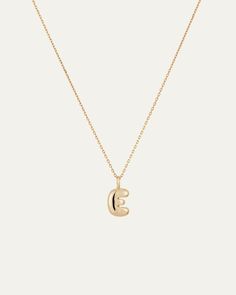 The Bubble Monogram Necklace is a 14K gold pendant that glides along a 14K gold, diamond cut cable chain. Wear your initial around your neck and add personalization to your stack. Bubble Letter Necklace, Bubble Letter, Gold Bubbles, Gold Letter Necklace, Jenny Bird, Bubble Letters