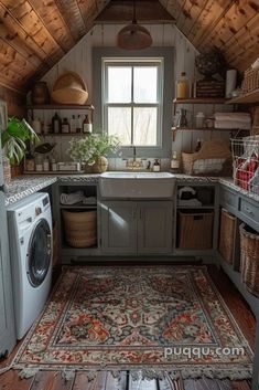 a washer and dryer in a small room with wooden walls, flooring and ceiling