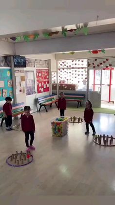 children are playing with toys in the playroom