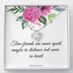 a white box with a pink flower on it and a quote from the book, a good friend is someone like you loving, caring, so sweet & true