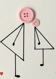 a pink button is attached to the side of a white card with black lines and hearts
