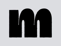 the letter m is made up of two black letters, one with an upper and lower letter