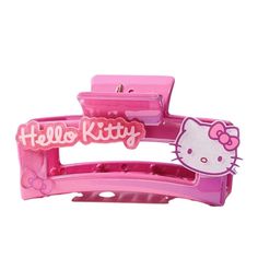 the hello kitty hair clip is pink