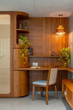 a wooden desk and chair in a room