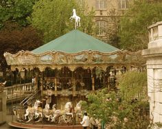 a merry go round in the middle of a park