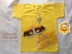 a child's yellow t - shirt with a pair of sunglasses on it