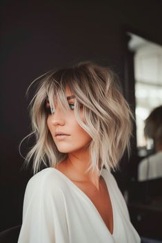 40 Shaggy Bobs for Fine Hair: The Ultimate Guide to Textured Chic - Luxe Luminous Style Inspiration Over 40 Hair, Long Choppy Bobs For Fine Hair, White Blonde Balayage Short Hair, Wedding Hair With Short Hair, Platinum Blonde With Shadow Root Short, Hairstyles Over 40 Fine Hair, Shaggy Textured Hair, Short Blonde Bob Fine Hair Over 40, Short Hair Middle Part Bangs