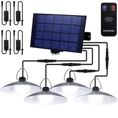 four lights and three remote controls are shown with the solar panel attached to each light