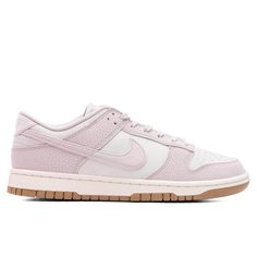 Taking on a leather upper, the Nike Dunk Low introduces a new iteration. The silhouette features perforations at the toe box, mid-panel, and collar. Air cushioning resides at the heel, while the Nike branding is embroidered at the heel. The tongue tag features branding, while the rubber outsole underneath solidifies the remainder of the design.     DUE TO THE LIMITED NATURE OF THIS PRODUCT, ALL SALES ARE FINAL. THIS ITEM IS NOT ELIGIBLE FOR DISCOUNTS OR SPECIAL PROMOTIONS.     Leather upper    L Bear Pink, Shoe Wishlist, Cute Nike Shoes, Shoe Inspo, Cute Nikes, Swag Shoes, Clean Shoes, Nike Dunk Low, Dunk Low