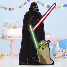 a star wars themed birthday party with cake and decorations