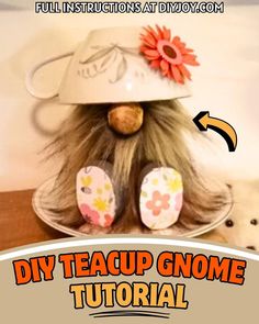 a close up of a stuffed animal on a table with text overlay that reads diy teacup gnome