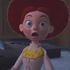 a cartoon character with red hair and green eyes wearing a yellow shirt, looking surprised