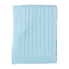 a blue knitted blanket on a white background
