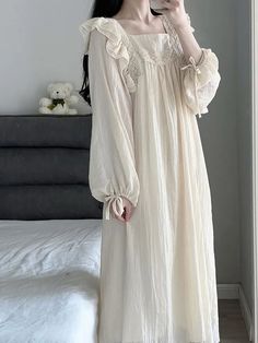 This elegant Coquette Lace Nightgown is crafted from a luxurious blend of fabrics for a comfortable and stylish fit. The all-over lace pattern is subtly sheer for a delicate and feminine look. Its adjustable straps, buttons, and drawstring waist make it the perfect nightgown for a perfect night’s sleep. Lace Dress Cottagecore, Sleeping Night Dress, Couture, Vintage Nightgown Hollywood Glamour, White Dress Night Gown, Lace Sleeping Gown, Nightgown Drawing Reference, Cute Pjs Drawing, Princess Sleeping Gown