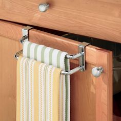 a towel rack with two towels hanging from it