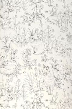 a drawing of rabbits and other animals on a white paper with black ink in it