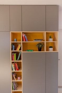 a bookshelf with several shelves filled with books