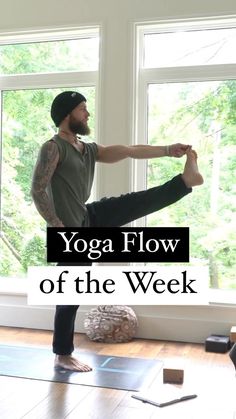 a man doing yoga in front of a window with the words yoga flow of the week