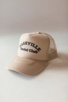Our Nashville Social Club Trucker Hat features a classic trucker design and is made of breathable fabric. Adjustable fit 100% Polyester Front 100% Polyester Mesh Back Not Eligible for Returns Trucker Hat Designs, Truck Hat, Lug Boots, Oversized Puffer, Taupe Boots, Tan Booties, Buckle Sandals, Sandals For Sale, Sweater Sale