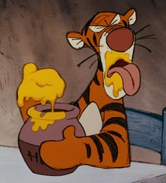 the tigger from winnie the pooh is holding a pot with honey on it
