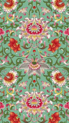 a green and red floral pattern with many flowers on it's sides, in the middle