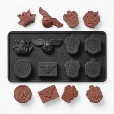 an assortment of chocolate molds on a tray