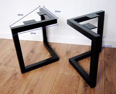 there are two black tables on the floor with measurements in front of them and one has an upside down design