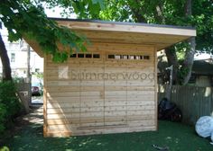 a wooden shed with the word summerwood written on it