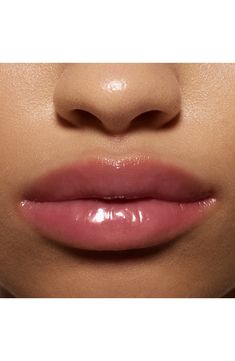 What it is: A shiny lip gloss with a cozy, cushiony feel that lasts. What it does: Made with avocado, rose hip, sunflower and jojoba oils for a hydrating, healing shine, this lip gloss stays put without being sticky. How to use: Can be applied as often as preferred—daily or even multiple times a day—to achieve desired look. Fragrance-free Made in the USA Avocado Rose, Lip Permanent Makeup, Eyeshadow Styles, Shiny Lip Gloss, Eyeliner Techniques, Neutral Lips, Makeup Brushes Guide, Best Lip Gloss, Flawless Makeup Application